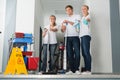 Group Of Happy Young Janitor Showing Thumbs Up Royalty Free Stock Photo