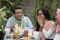 Group of happy young muslim having dinner outdoor during ramadan