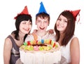 Group of happy young people with cake. Royalty Free Stock Photo