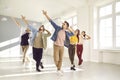 Group of happy young people having a contemporary dance class in a modern studio Royalty Free Stock Photo
