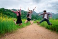 Group of happy young people jumping in the air. Royalty Free Stock Photo