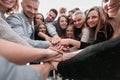 Group of happy young people showing their unity Royalty Free Stock Photo