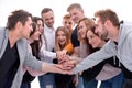 Group of happy young people showing their unity Royalty Free Stock Photo