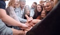 Group of happy young people showing their unity Royalty Free Stock Photo