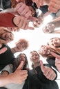 Group of happy young people standing in a circle Royalty Free Stock Photo