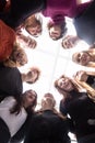 Group of happy young people standing in a circle Royalty Free Stock Photo