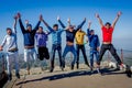 Group of happy young students enjoying summer vacation