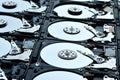 Group of hard disk drives. Many Open Hard drives. Close-up of the inside of PC hard drives. Technology background Royalty Free Stock Photo