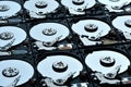 Group of hard disk drives. Many Open Hard drives. Close-up of the inside of PC hard drives. Technology background Royalty Free Stock Photo