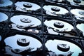 Group of hard disk drives. Many Open Hard drives. Close-up of the inside of PC hard drives. Technology background. Selective focus Royalty Free Stock Photo