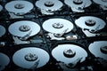 Group of hard disk drives. Many Open Hard drives. Close-up of the inside of PC hard drives. Technology background. Selective focus Royalty Free Stock Photo