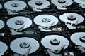 Group of hard disk drives. Many Open Hard drives. Close-up of the inside of PC hard drives. Technology background. Selective focus Royalty Free Stock Photo