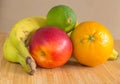 A group of healthy fruits on a bamboo plate. Royalty Free Stock Photo