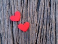 Group hearts placed on the wooden floor and have copy space for design in your work. Red hearts convey the day of love