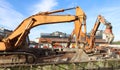 Group of heavy excavators at work for an urban redevelopment