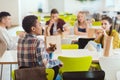group of high school students chatting while taking lunch Royalty Free Stock Photo
