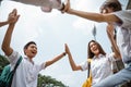 Group of high school students forming circle symbol of unity Royalty Free Stock Photo