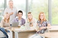 Group of high-school students with professor