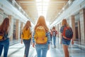 Group Of High School Students Running Along Corridor Royalty Free Stock Photo