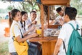 group of high school students snacking when going home