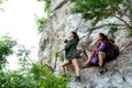 Group Hiker woman and friend climb up the last section in mountains