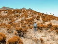 A group of hikers against a mountain background at Elephant Hill, Aberdare Ranges, Kenya Royalty Free Stock Photo