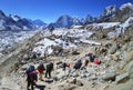 Group of hikers with backpacks on the trek in Himalayas