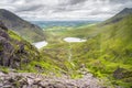 Group of hikers climbing Devils Ladder to reach Carrauntoohil mountain