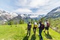 Group of hikers exploring the Alps, outdoor activities in summer