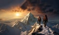 Group of hikers walking on a mountain at sunset,beautiful mountains with snow, active sport concept, backpackers on peak Royalty Free Stock Photo