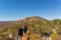 a group of Hikers on the way to the top of Mount Sonder just outside Alice Springs, West MacDonnel National Park, Australia