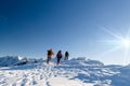 Group hikers in winter mountains, beautiful landscape and blue sky Royalty Free Stock Photo