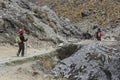 A group hiking the dangerous Salkantay Mountain