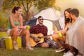 Group of hipster young people on camping trip Royalty Free Stock Photo