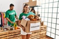 Group of hispanic volunteers working at charity center Royalty Free Stock Photo