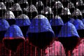 Group of hooded hackers shining through a digital russian flag