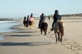 group of horse riders at the beach Royalty Free Stock Photo