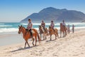 Horse Riders on Beach Royalty Free Stock Photo