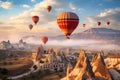 A group of hot air balloons soaring through the sky above a picturesque valley, Majestic hot air balloons floating over Cappadocia