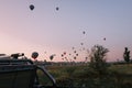 Group of hot air balloons take flight from cappadocia fields Royalty Free Stock Photo