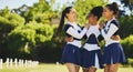 Group, hug or happy cheerleader with women outdoor in training or sports event together. Teamwork, smile or proud girl Royalty Free Stock Photo