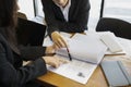 Group of human resources departments reading resume together. Royalty Free Stock Photo