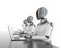 Group of humanoid robots with laptop computers isolated on white