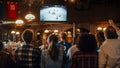 Group of Ice Hockey Fans Watching a Live Match Broadcast in a Sports Pub on TV. People Cheering Royalty Free Stock Photo