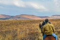 Group of Indian Horse riding riders on a trail in Drakensberg re Royalty Free Stock Photo