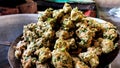 Group of Indian Street Food Frying Pakora or Bhajiya