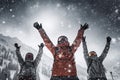 A group of individuals standing together at the top of a snow-covered slope, Friends with hands up on skiing, AI Generated Royalty Free Stock Photo