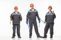 Group of industrial workers. Isolated over white background Royalty Free Stock Photo