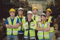 Group of industry people worker engineer team mix race enjoy working in heavy factory standing together happy smile portrait Royalty Free Stock Photo