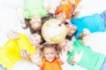 Group of international funny kids with globe earth Royalty Free Stock Photo